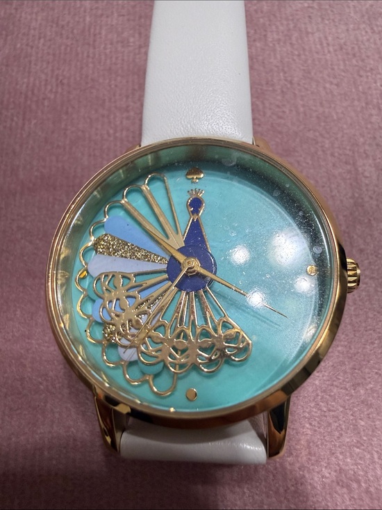 kate spade Accessories - kate spade turquoise peacock motif watch with white strap